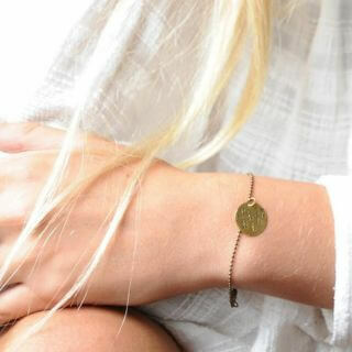 muse wears stamped woodland brass bracelet