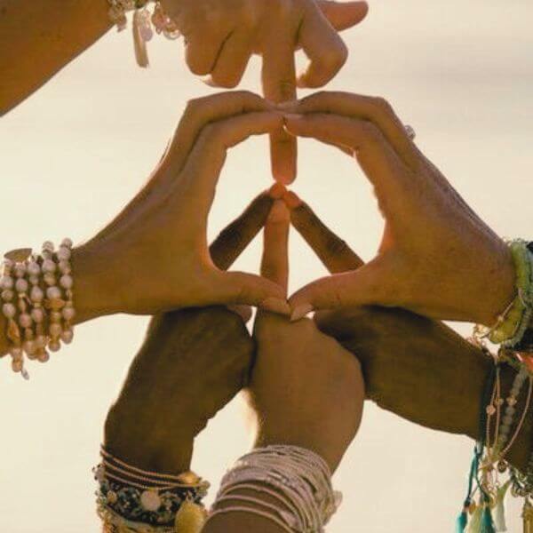 hands make a symbol of peace